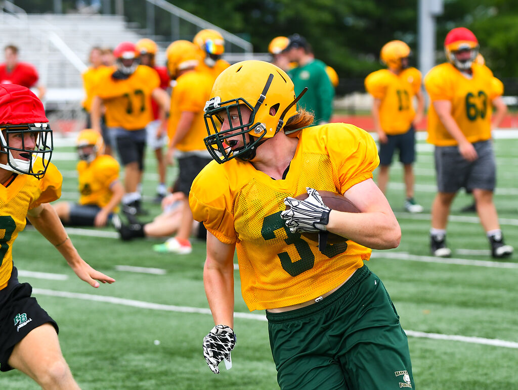 Joseph Kallenbach tries to break through a defense line